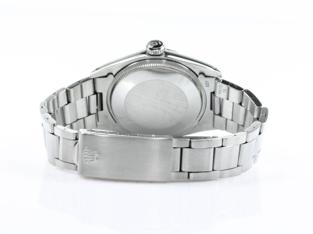 1500_Rolex_Date_Stahl_34mm_Folded_Oysterband_1970_Champagner_Dial_10-scaled
