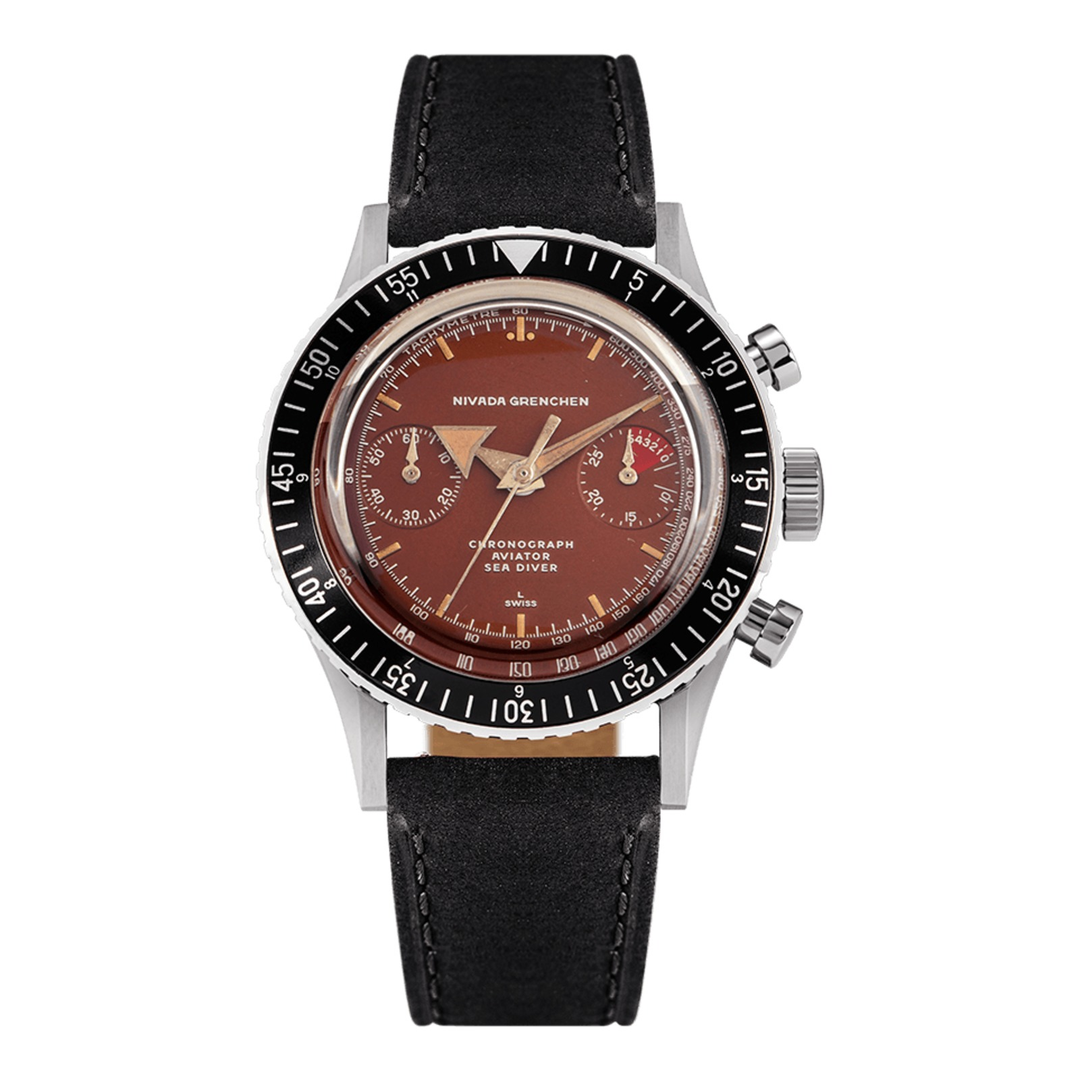 Nivada Grenchen Chronomaster Broad Arrow Tropical Inter.Bezel Manual 85007M – Herrenuhr 38 mm, Zifferblatt Braun