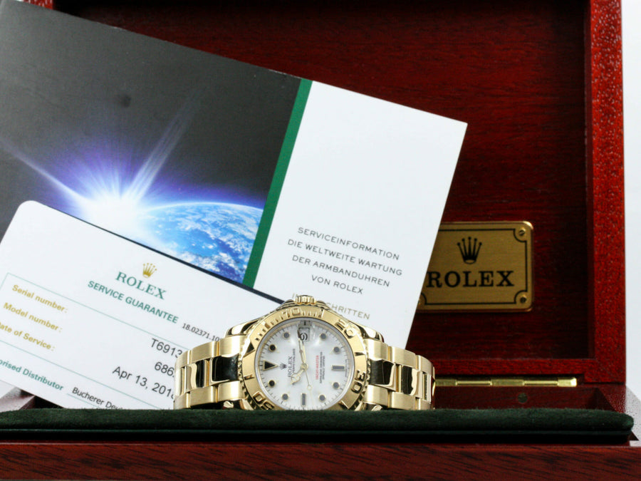 68628_RLX_Yacht-Master_18k_Gold_White_Dial_Servicepapier_0-scaled-1.jpg